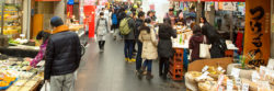 Osaka's food market, Kuromon Ichiba, draws travelers and restauranteurs alike in search of the fresh ingredients like blowfish and oysters