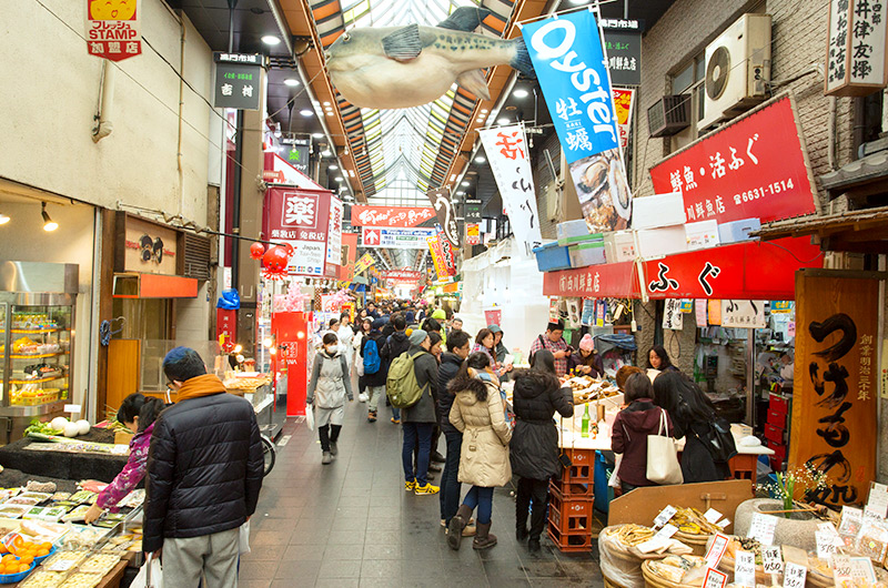 Osaka's food market, Kuromon Ichiba, draws travelers and restauranteurs alike in search of the fresh ingredients like blowfish and oysters