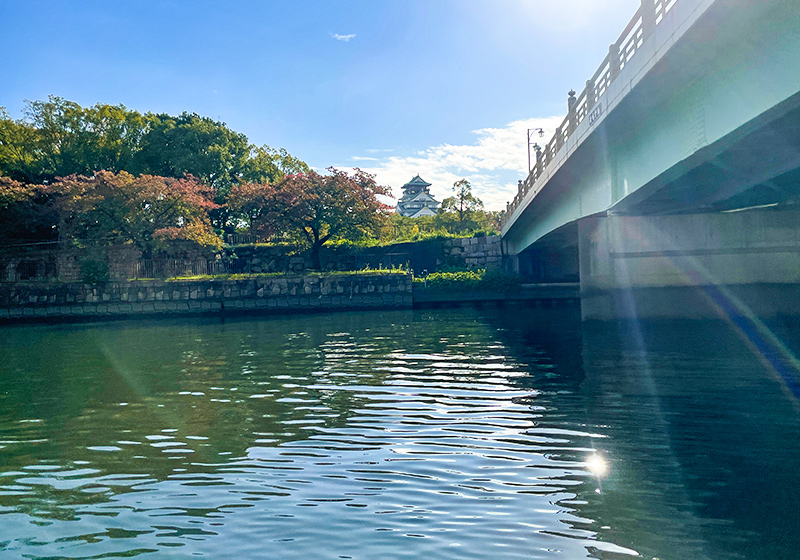 view of Osaka Castle from Aqualiner cruise boat