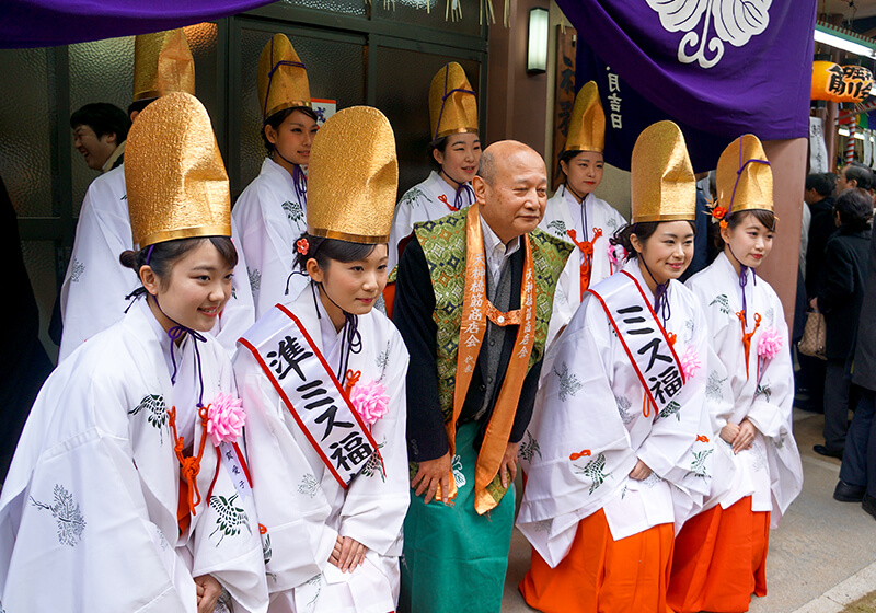 women in traditional kimono and eboshi hat for Toka Ebisu festival