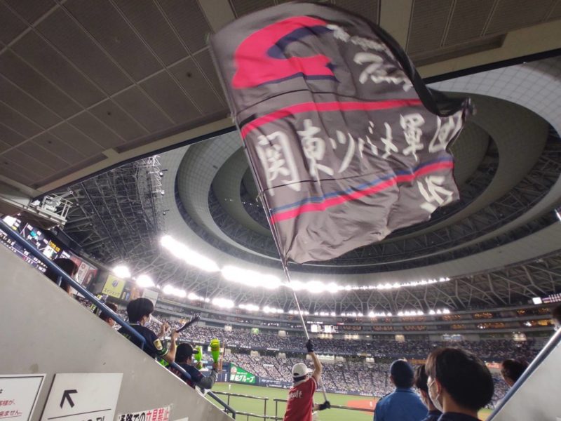 Japanese baseball team flags waved over audience
