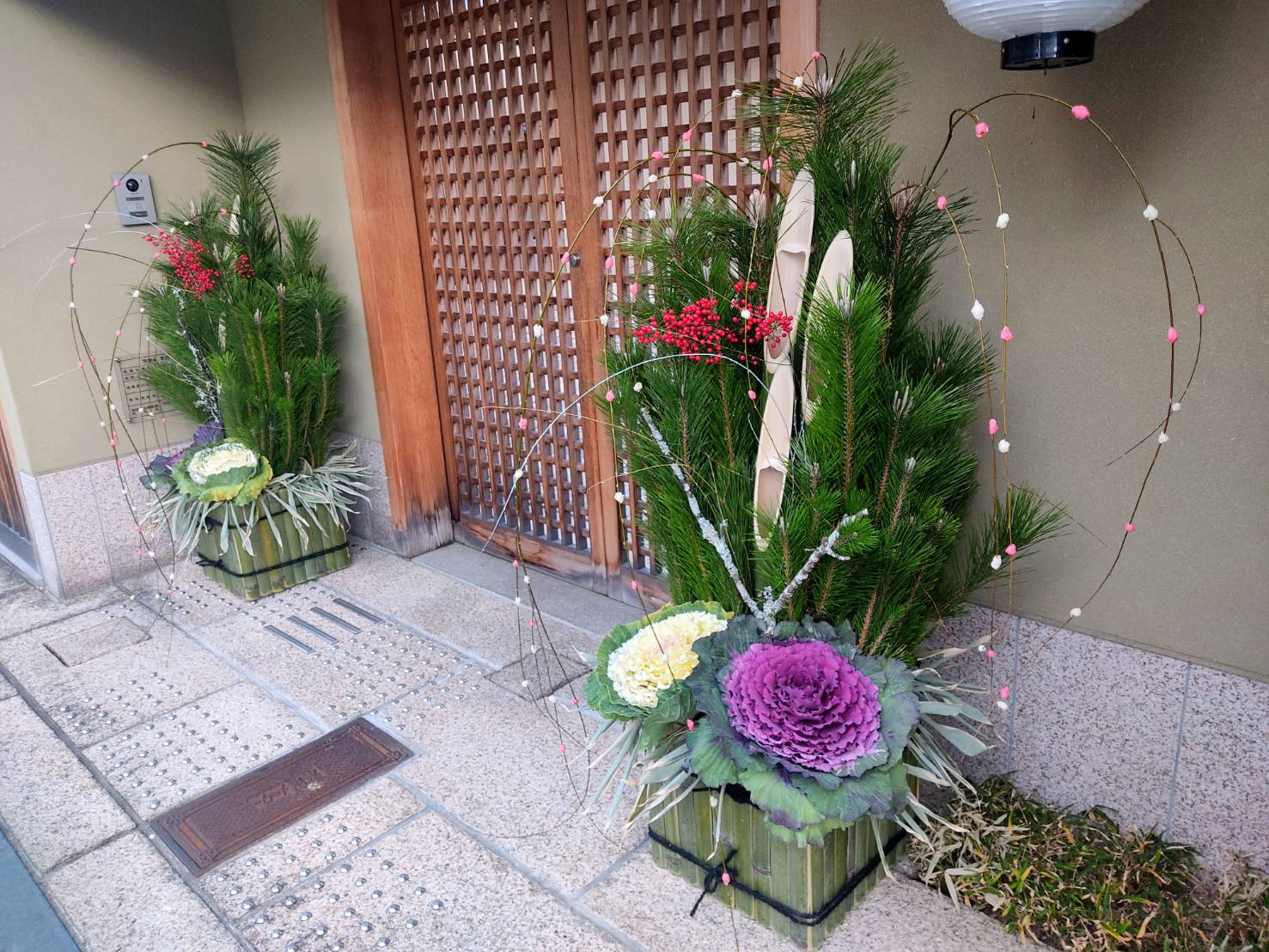 large kadomatsu New Year decorations on sides of doorway