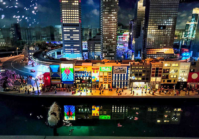 Dotonbori made of legos with reflections at night at Legoland Discovery Center Osaka