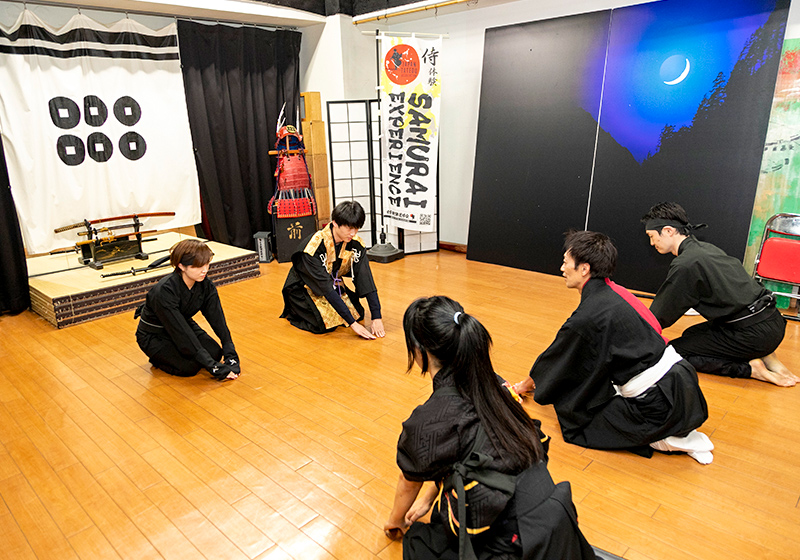 bowing during the samurai experience at the Japan Sword Fighting Association in Osaka
