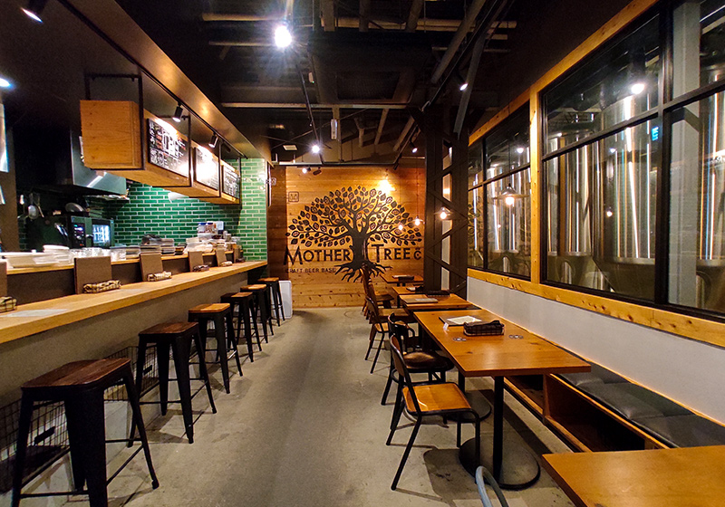 craft beer base pub area with beautiful brew tanks on display in Osaka