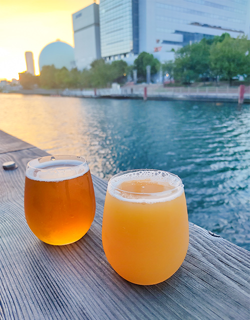 craft beer from Marca at Tugboat Taisho with views of sunset along the river