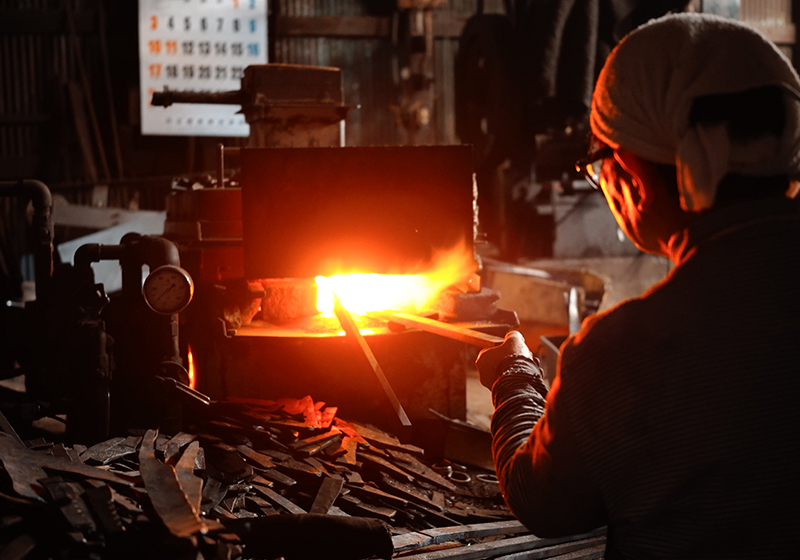 Japanese knives being forged by craftsman in Sakai, Osaka