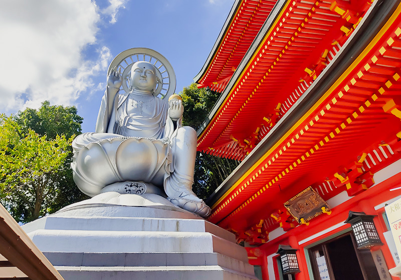 Giant Buddha statue in front of Gyokuzo-in at Shigisan Temple in Nara